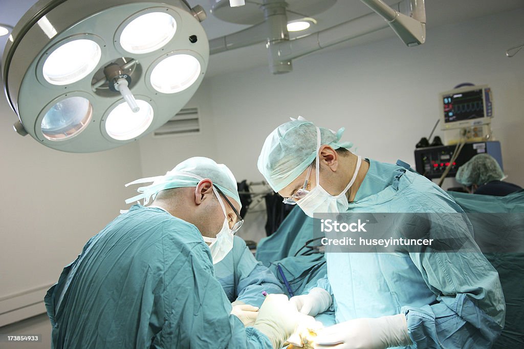 Doctors on the operations. Doctors on the orthopedic  operations, Operation room.  Accidents and Disasters Stock Photo