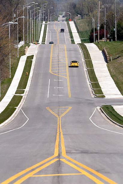 istock Lane Markings on a Quiet Suburban Street 173855239