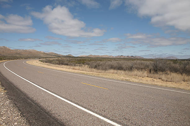 istock Curves in a Desert Road 173855247