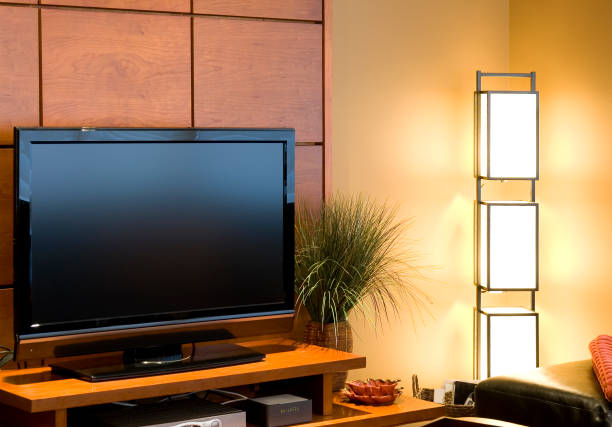 istock New flat screen tv on stand in modern living space 173856494