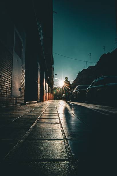 istock the man is standing alone near an empty building on a street 1738587742