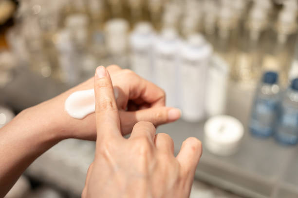 istock Woman testing and applying moisturizer lotion in her hand. product testing, care cosmetics. Healthy skin care. 1738603369