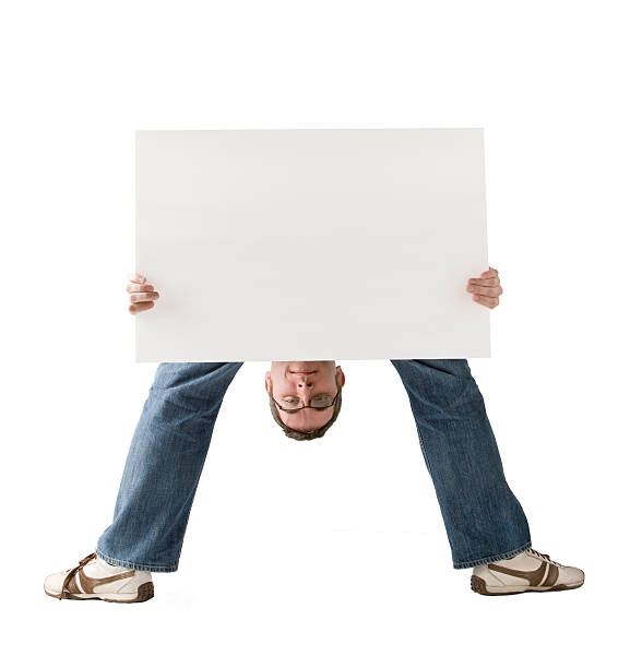 istock Blank sign - man with head between his legs. 173860766