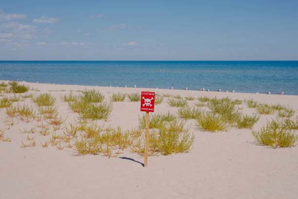 Mines at the Ukraine beach Danger. Mines at the beach, war in Ukraine 2022 odessa beach stock pictures, royalty-free photos & images