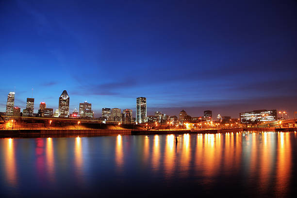 Close-up view of Montreal, Quebec. Cityscape of downtown skyscrapers, capturing architectural details, glass facades, and concrete structures at dusk.