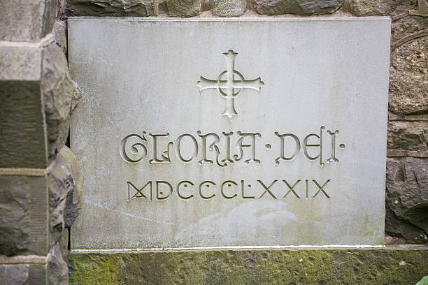 istock Gloria Dei Plaque with Roman Numerals and Cross 173861137