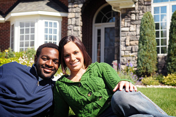 istock Young Couple with New Home 173862212