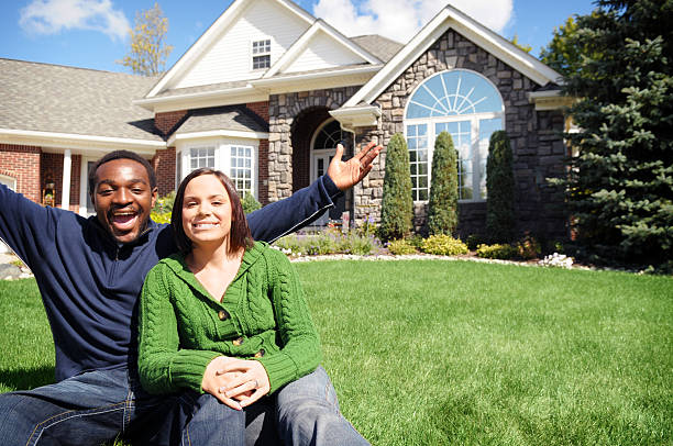 istock Young Couple with New Home 173862214