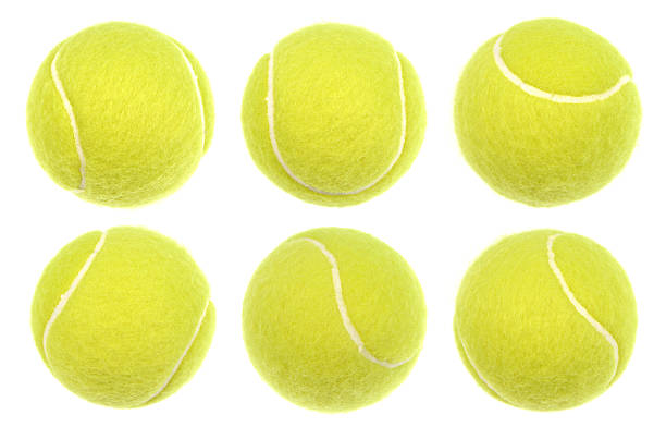 Six tennis balls isolated on a white background Close up macro shot of every tennis ball with highest possible level of details. Real professional sport equipment. tennis ball stock pictures, royalty-free photos & images