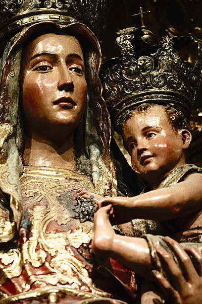 Virgin Mary Holding Baby Jesus, Blue Sky and Flowers Background
