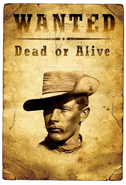 An old wanted poster from the American Wild West for an outlaw