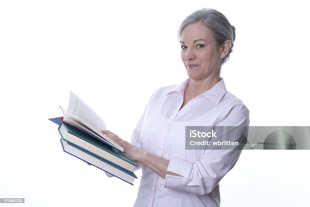 Женщина с книги (XXL - Стоковые фото 45-49 лет роялти-фри