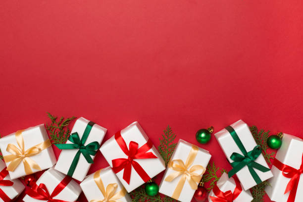 istock Gift boxes with decor on color background, top view 1738628637