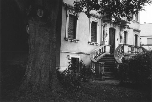 Garden of an Ancient Abandoned House. Quistello, Mantua Province, Italy. Black and White Film Photography