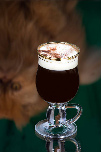 Irish coffee with cat reflection