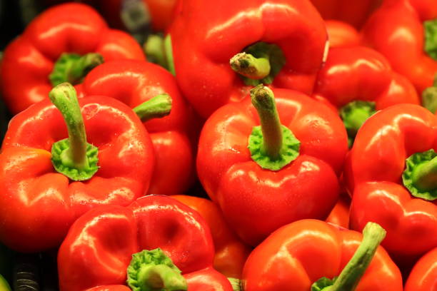 red peppers for sale displayed in an orderly manner
