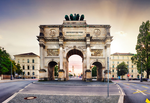 Dramatic sunset over Siegestor - Victory Gate  arch in downtown Munich, Germany