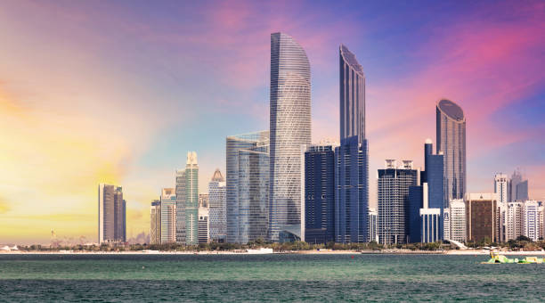 istock Abu Dhabi skyline with reflection in sea, United Arab Emirates - panorama 1738633413