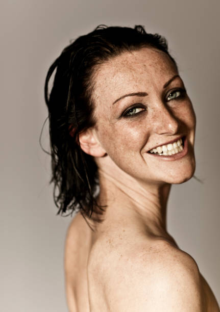 istock nude woman with a cheese grin 173863389