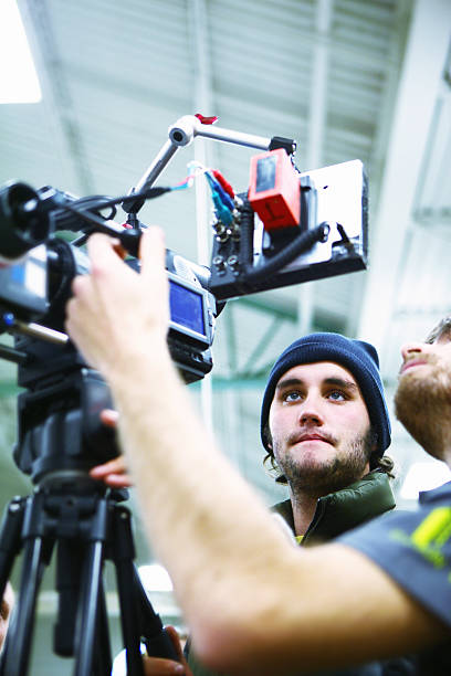 Two engineers filming themselves stock photo