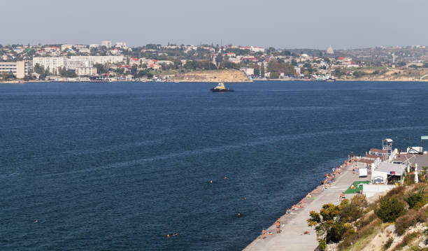 istock People rest at the beach. Khrustalny aerial view, Crimea 1738640676