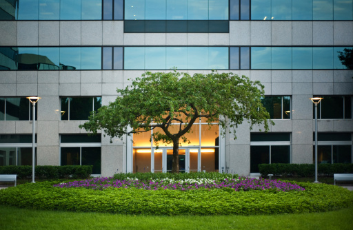 Modern office building with attractive landscaping. Also see: 