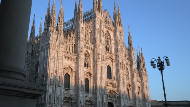 Historic Landmark Duomo Cathedral at Sunset in Milan, Italy