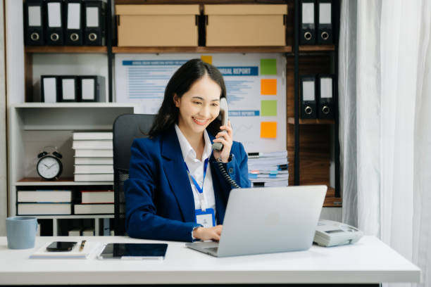 istock Woman freelancer is working her job on computer tablet and laptop Doing accounting analysis report real estate investment data, Financial 1738644451