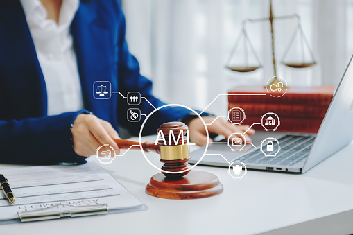 AML Anti Money Laundering Financial Bank Business Concept. judge in a courtroom using laptop and tablet with AML anti money laundering icon on virtual  screen.