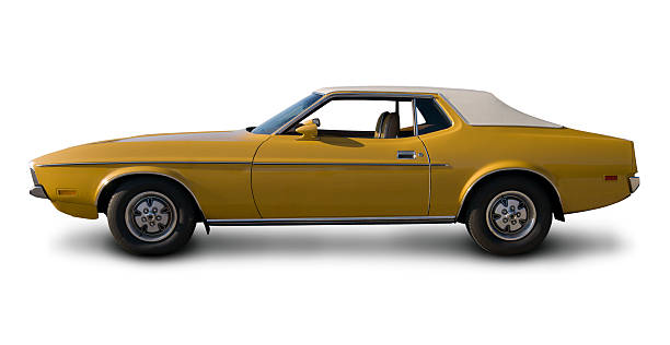 Early 1970's Ford Mustang A Ford Mustang from the early 1970's. Clipping path on vehicle. 1971 stock pictures, royalty-free photos & images