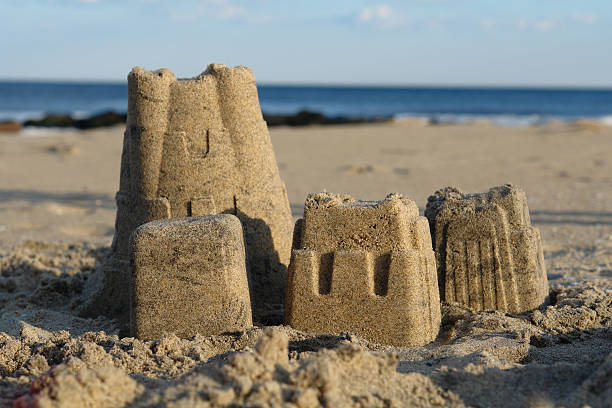 Sandcastle on the beach stock photo
