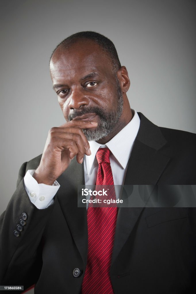 Seguro un hombre de negocios negro - Foto de stock de 50-59 años libre de derechos