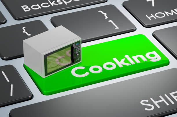 istock Microwave oven on keyboard. Cooking green key. 3D rendering 1738660358