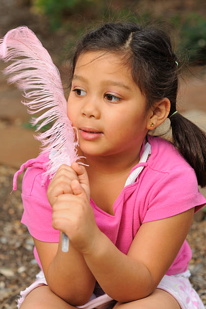 istock Feather girl in pink 173866083
