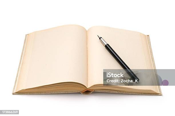 Fountain Pen On Opened Hardback Book Stock Photo - Download Image Now - Fountain Pen, Note Pad, Pen