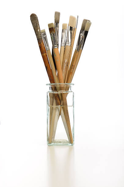 istock Artist brushes in glass jar 173866374