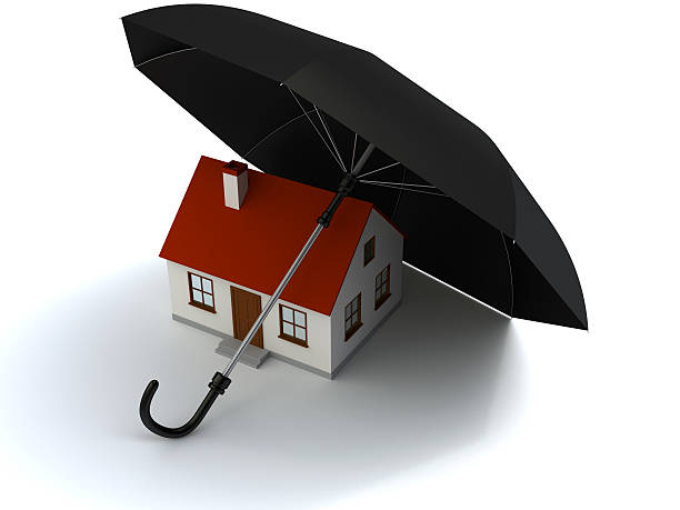 House under umbrella stock photo