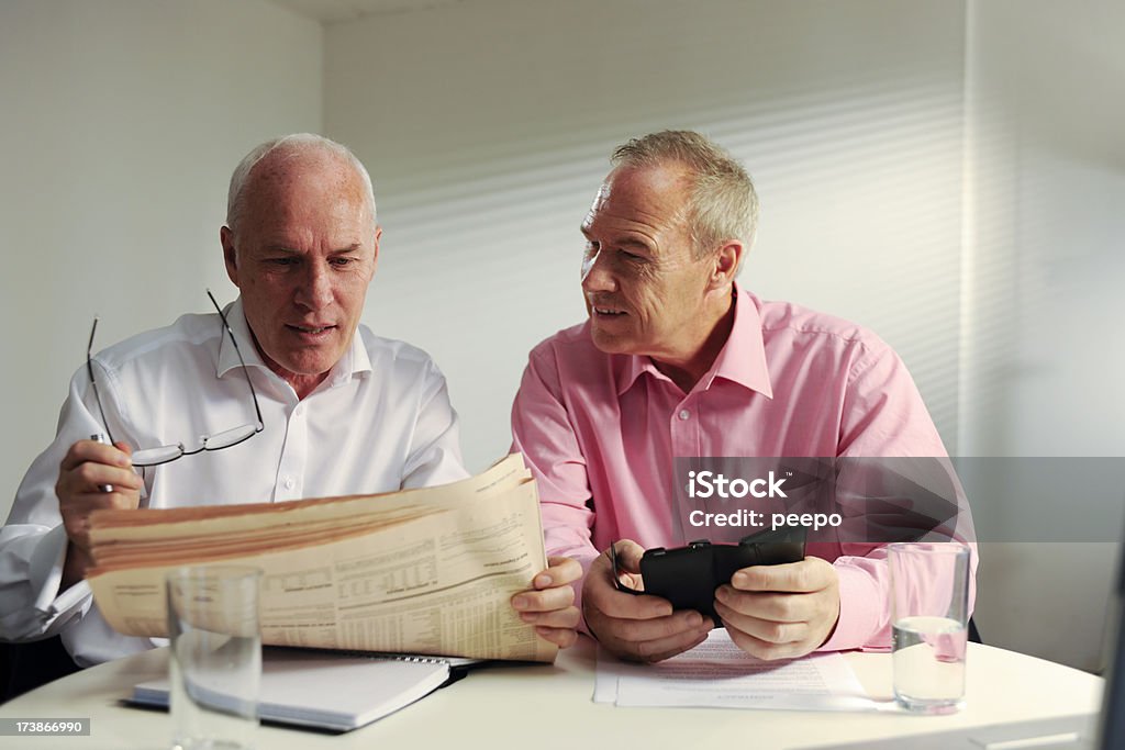 senior business men in meeting 60-64 Years Stock Photo