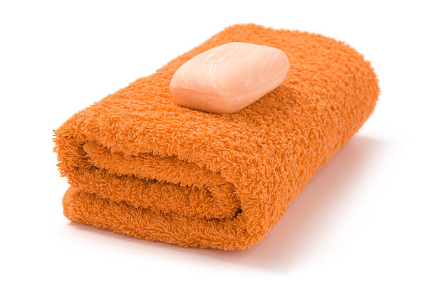 White Bath Towel Hanging on the Bathroom