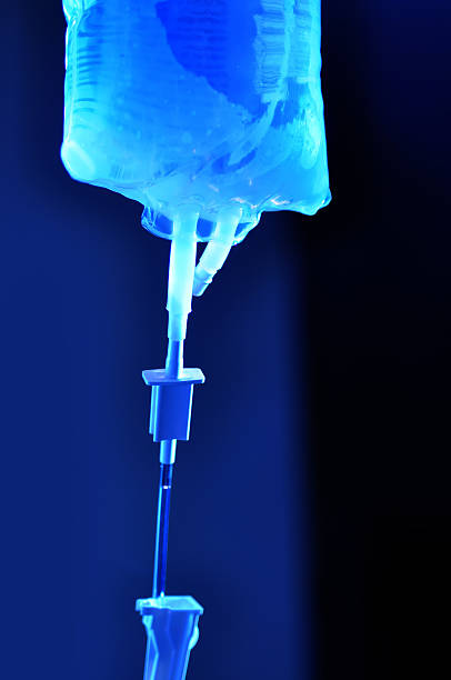 intravenous saline IV drip stock photo