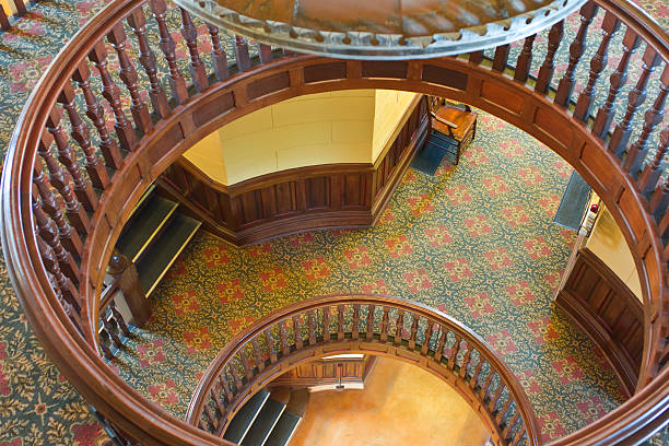 istock Presidio County Texas Courthouse Circular Rails Stairwell from top floor. 173868238