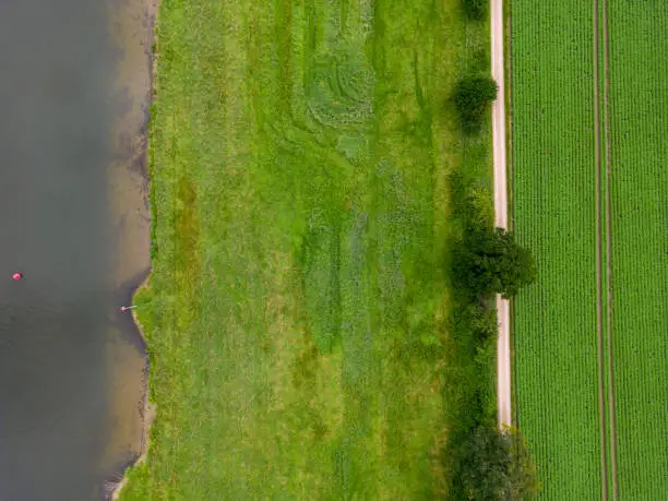 Top view of footpath next to the maas river near Kessel in Limburg the Netherlands