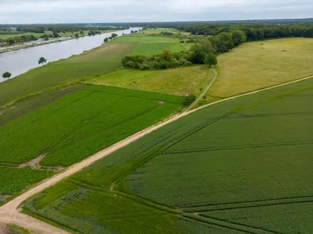 Aerial view of footpath next to the maas river near Kessel in Limburg the Netherlands