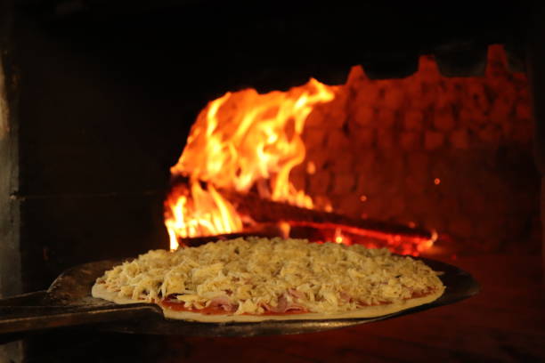 istock The making of pizza. 1738689698