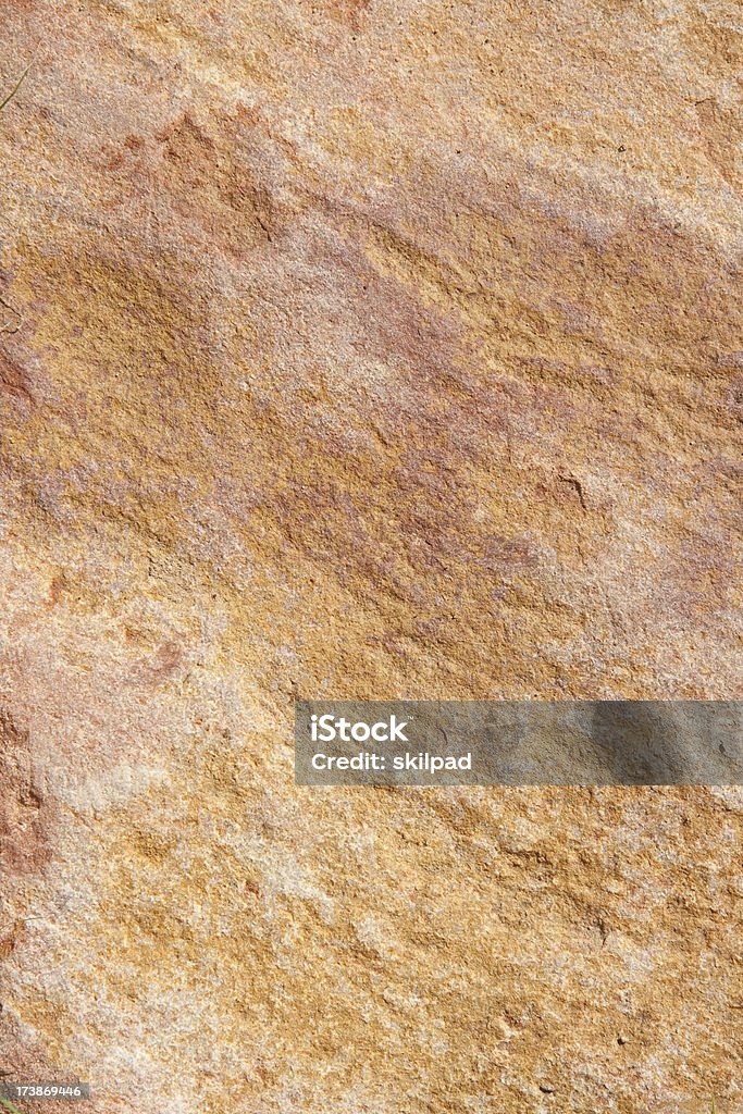 sandstone background Natural sandstone background with a rough rock texture and purple and ochre shades. Backgrounds Stock Photo