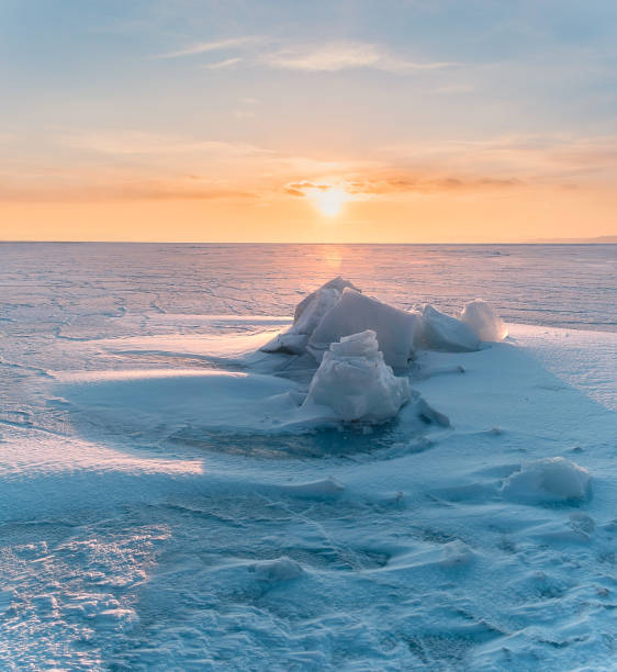 istock Snowdrifts on the ice surface during sunset. 1738696635