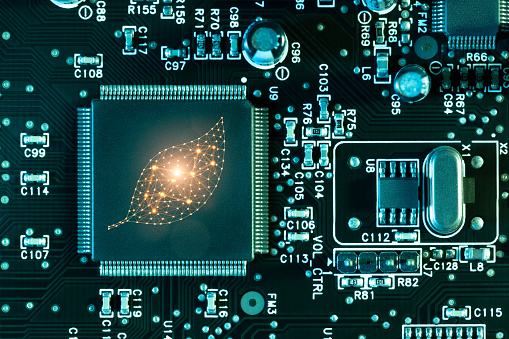 Artificial intelligence leaf computer chip concept on circuit board. This file is cleaned and retouched.