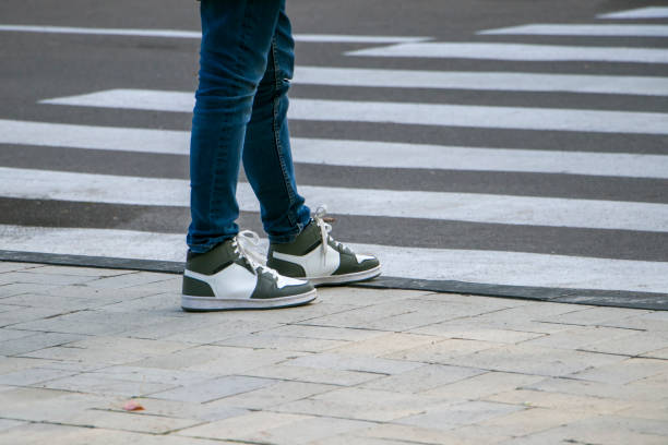 istock A child crosses a zebra crossing. 1738701252
