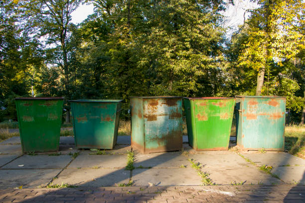 istock Square metal outdoor trash containers 1738701844