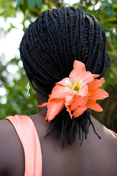 istock African Hair style with flowers 173870195